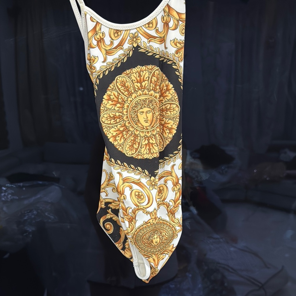Elegant Gold and Black Swimsuit